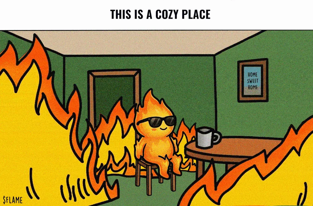 Animated take on the This Is Fine comic: FLAME in sunglasses sits smiling at a table with a mug in a green room engulfed in flames, a HOME SWEET HOME picture on the wall, captioned THIS IS A COZY PLACE.